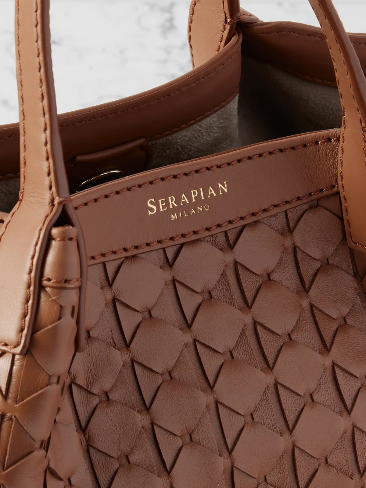 Secret Mini Woven Leather Shoulder Bag