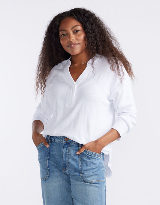 Image of a model wearing Tops. Productname: Henley Sunset Top - in White colour by brand - White & Co.