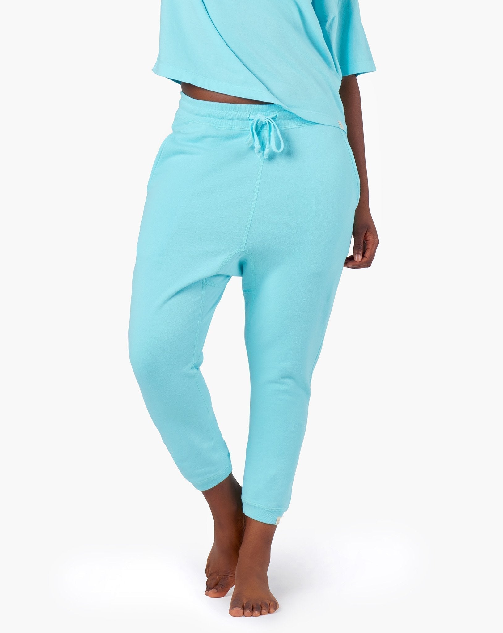 Image of a model wearing Pants. Productname: Core Jogger Sky Blue in Sky Blue colour by brand - TKEES