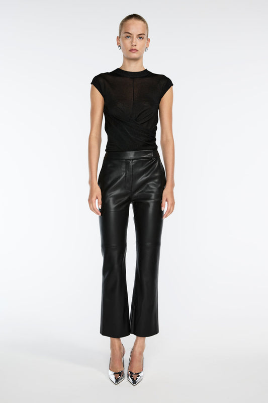 Image of a model wearing Pants. Productname: Infinite Limits Crop Pant in Black colour by brand - Manning Cartell