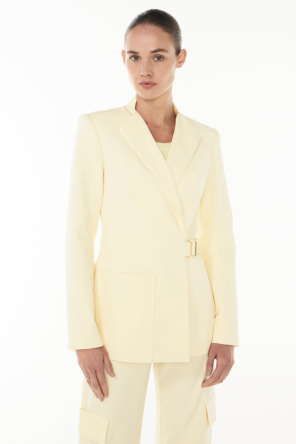Image of a model wearing Outerwear. Productname: Dune Rider Blazer in PALE YELLOW colour by brand - Manning Cartell