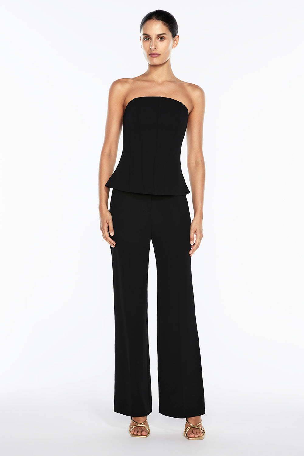 Image of a model wearing Tops. Productname: Editor's Pick Bustier in BLACK colour by brand - Manning Cartell