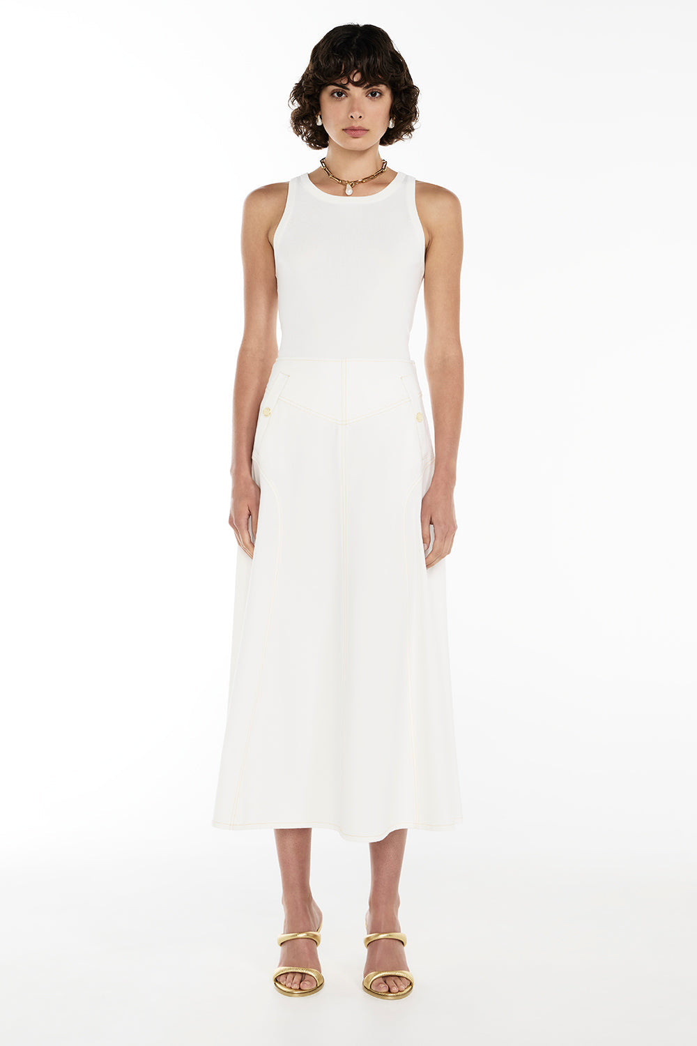 Image of a model wearing Tops. Productname: Catch Up Tank in WHITE colour by brand - Manning Cartell
