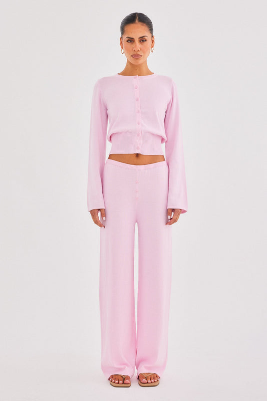 Image of a model wearing Pants. Productname: SNDYS AUGUST BUTTON PANTS in Pink colour by brand - SNDYS