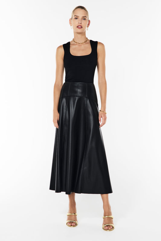 Image of a model wearing Skirts. Productname: Infinite Limits Skirt in BLACK colour by brand - Manning Cartell