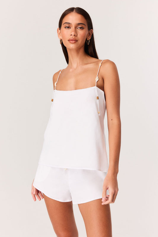 Image of a model wearing Tops. Productname: SNDYS ATTINA TOP in White colour by brand - SNDYS