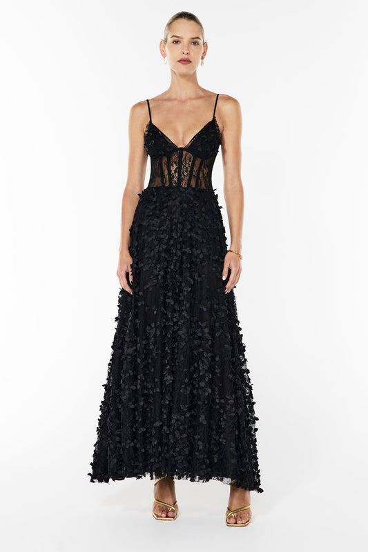 Image of a model wearing Tops. Productname: Enchantment Bralette Dress in BLACK colour by brand - Manning Cartell