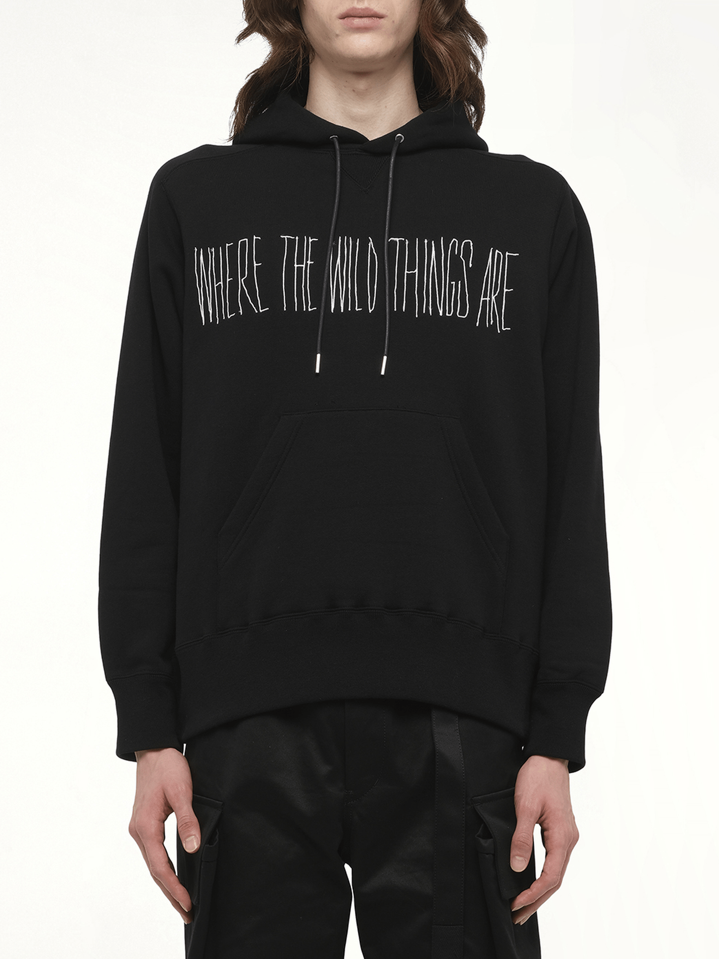 Image of a model wearing Outerwear. Productname: SACAI WHERE THE WILD THINGS ARE Logo Hoodie in Black colour by brand - SACAI