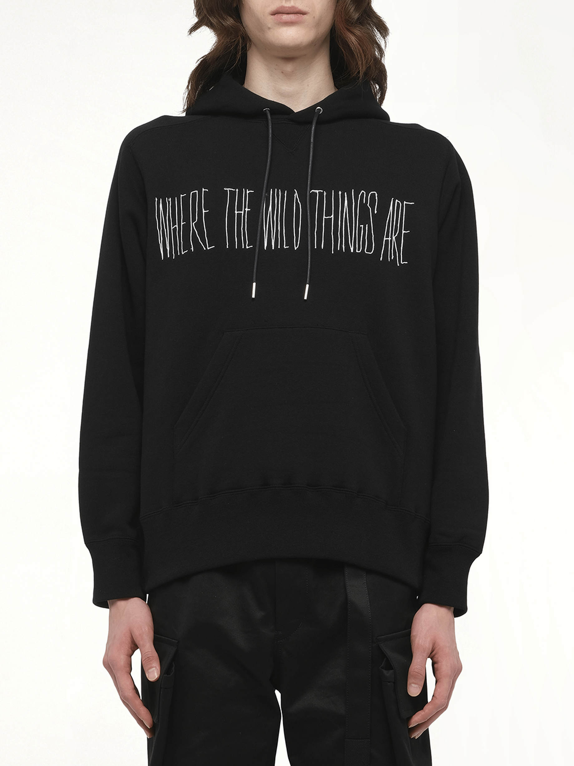 Image of a model wearing Outerwear. Productname: SACAI WHERE THE WILD THINGS ARE Logo Hoodie in Black colour by brand - SACAI