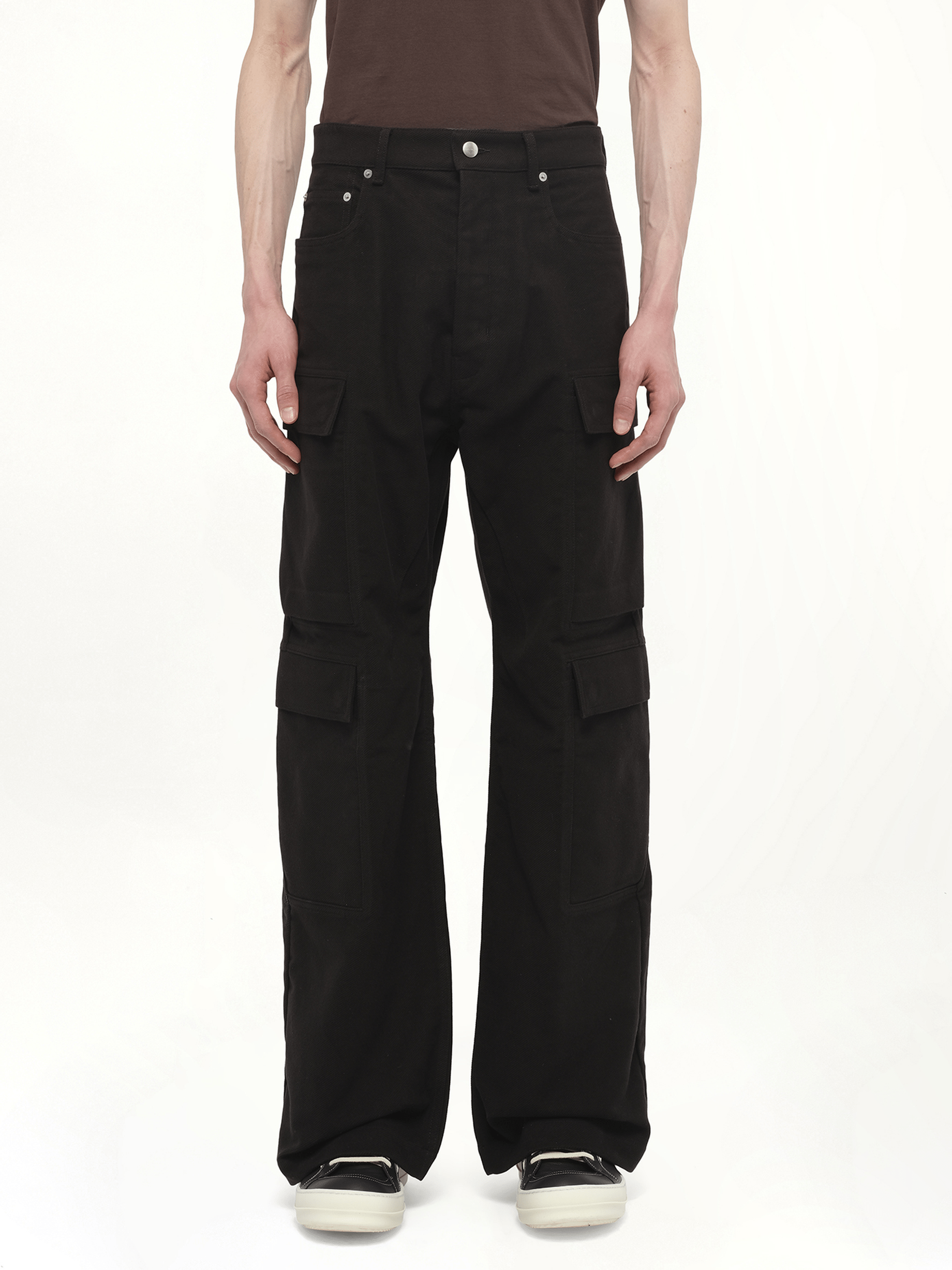Image of a model wearing Denim. Productname: RICK OWENS Double Cargo Jeans in Black colour by brand - RICK OWENS