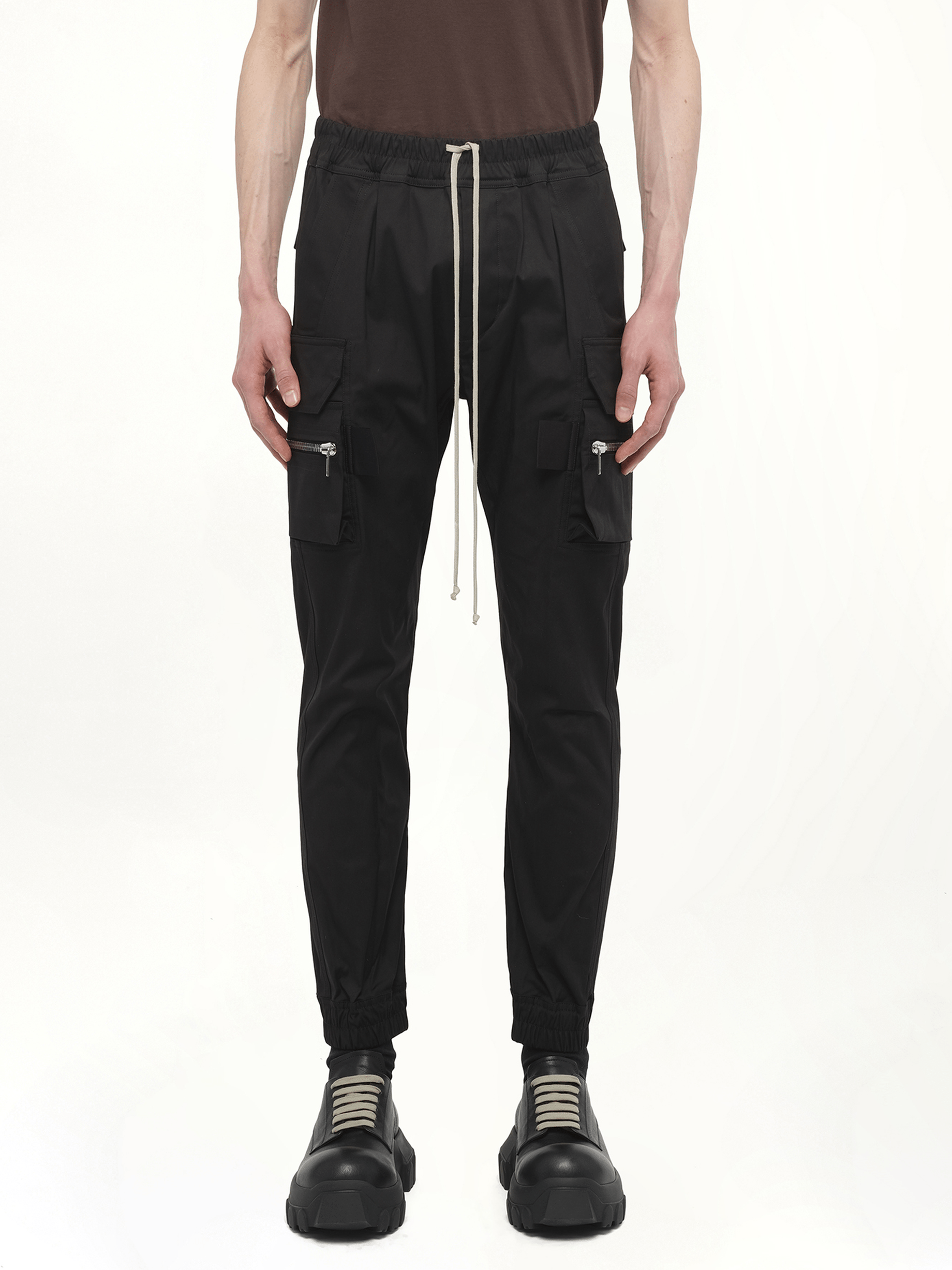 Image of a model wearing Pants. Productname: RICK OWENS Mastodon Cargo Pants in Black colour by brand - RICK OWENS