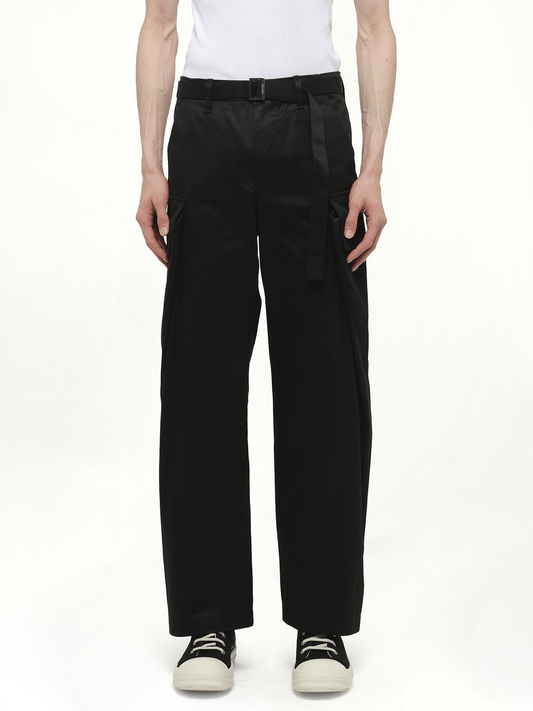Image of a model wearing Pants. Productname: SACAI Cotton Chino Pants in Black colour by brand - SACAI