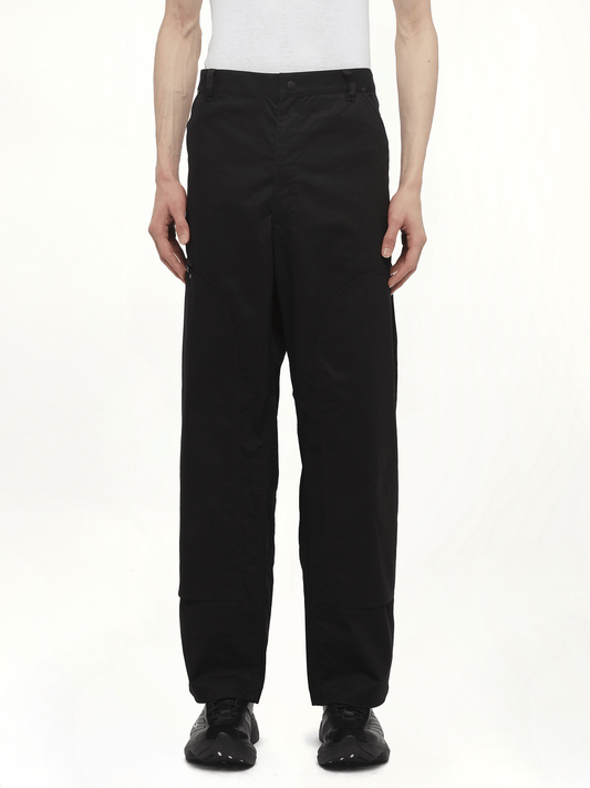 Image of a model wearing Pants. Productname: Y-3 Ut Twill Straight Leg Pants in Black colour by brand - Y-3