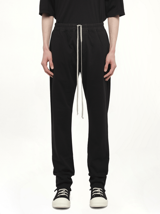 Image of a model wearing Pants. Productname: RICK OWENS DRKSHDW Berlin Drawstring in Black colour by brand - RICK OWENS DRKSHDW