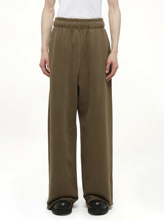 Image of a model wearing Pants. Productname: ENTIRE STUDIOS Full Sweatpants in BROWN colour by brand - ENTIRE STUDIOS
