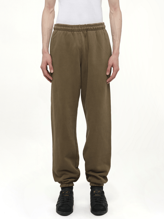 Image of a model wearing Pants. Productname: ENTIRE STUDIOS Heavy Sweatpants in Brown colour by brand - ENTIRE STUDIOS