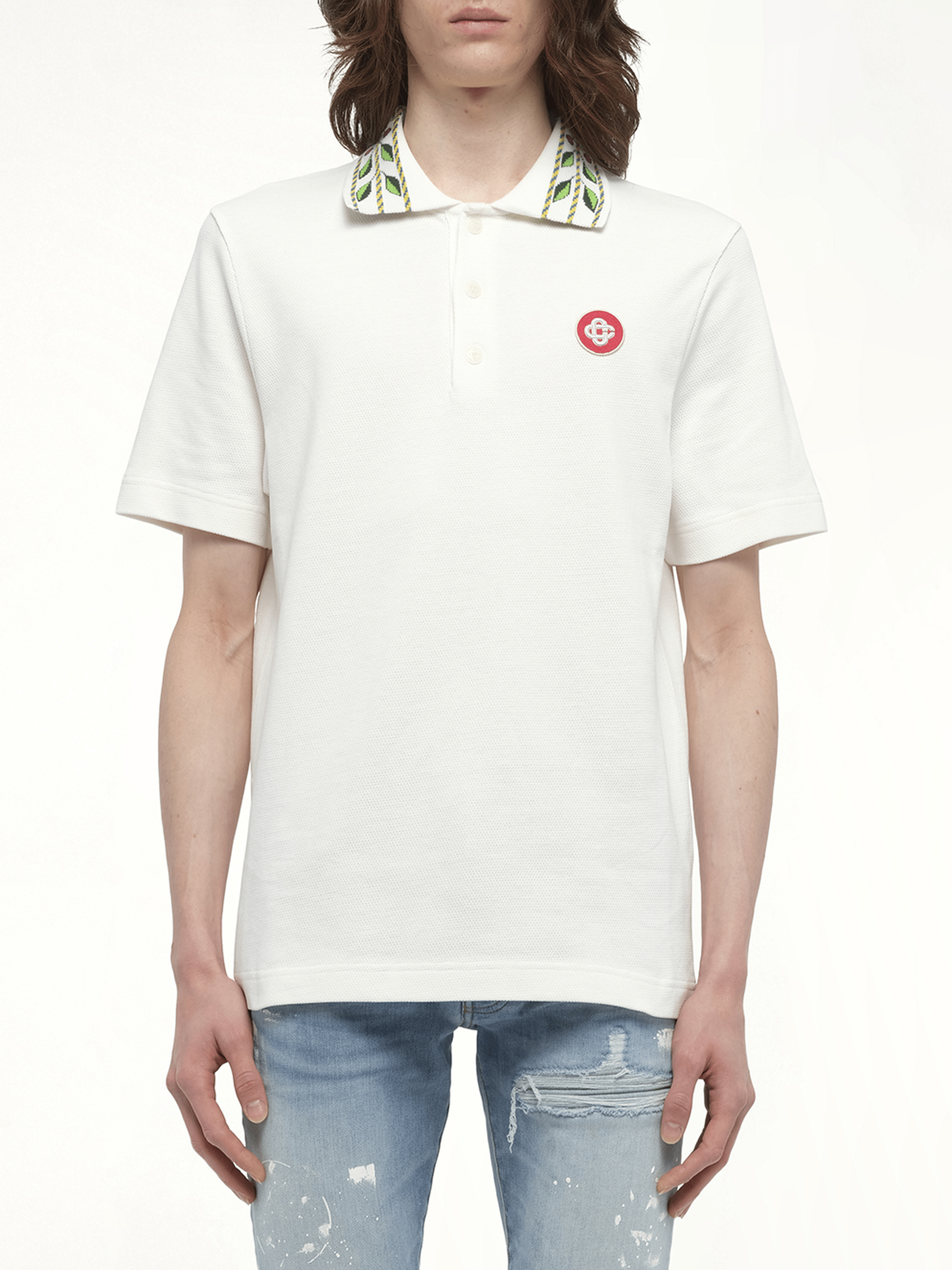 Image of a model wearing Tops. Productname: CASABLANCA Classic Laurel Pique Polo in WHITE colour by brand - CASABLANCA