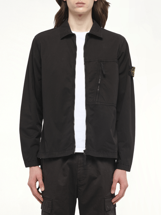 Image of a model wearing Tops. Product name - 120000 Supima Overshirt in Black colour by brand - STONE ISLAND