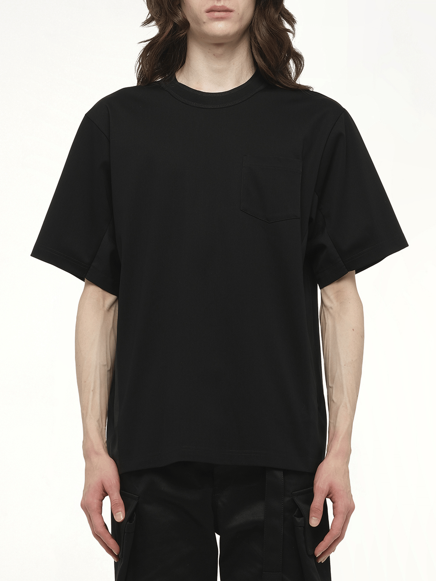 Image of a model wearing Tops. Productname: SACAI Suiting x Cotton Jersey T-Shirt in Black colour by brand - SACAI
