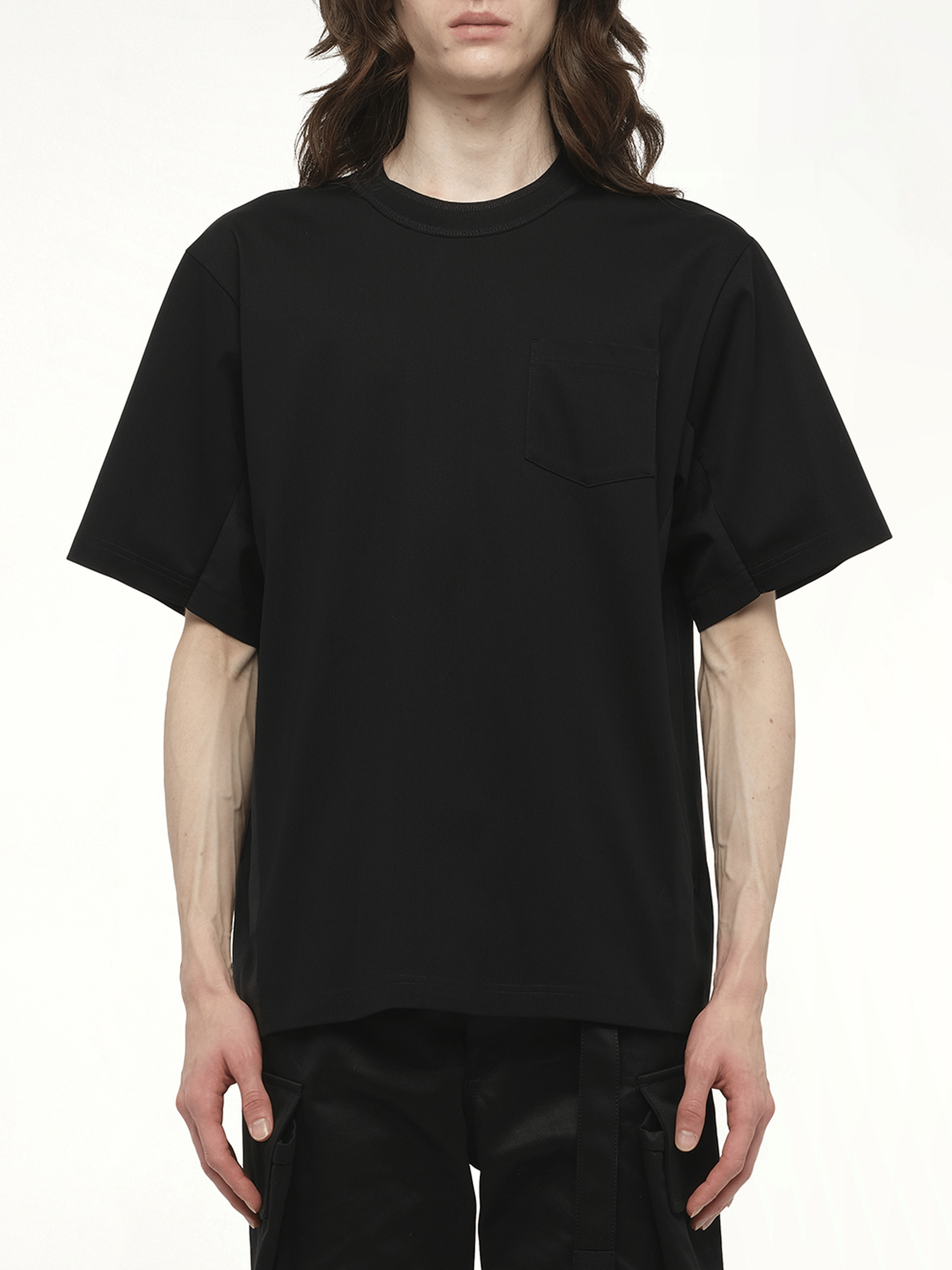 Image of a model wearing Tops. Productname: SACAI Suiting x Cotton Jersey T-Shirt in Black colour by brand - SACAI
