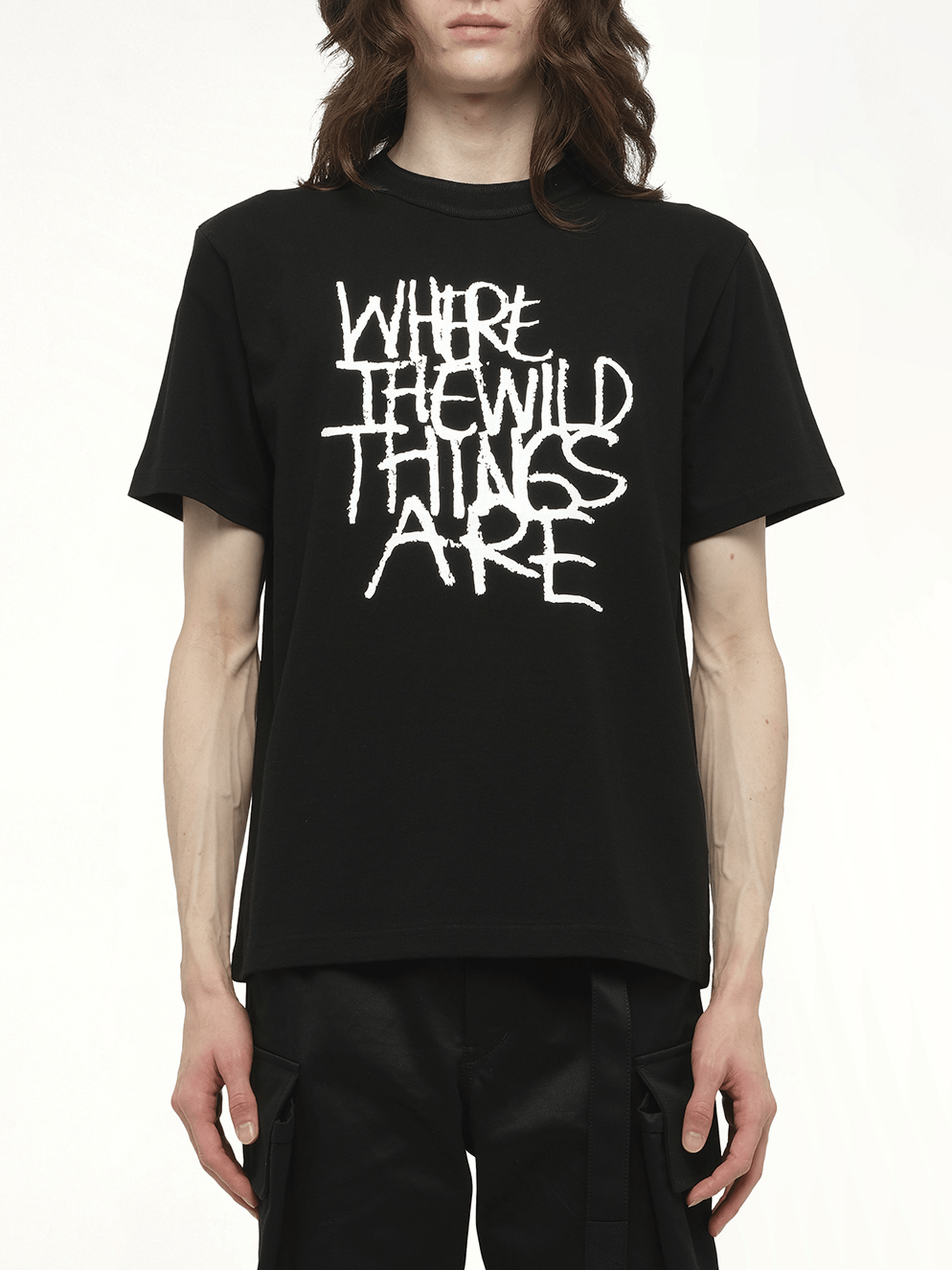 Image of a model wearing Tops. Productname: SACAI WHERE THE WILD THINGS ARE Logo T-Shirt in Black colour by brand - SACAI