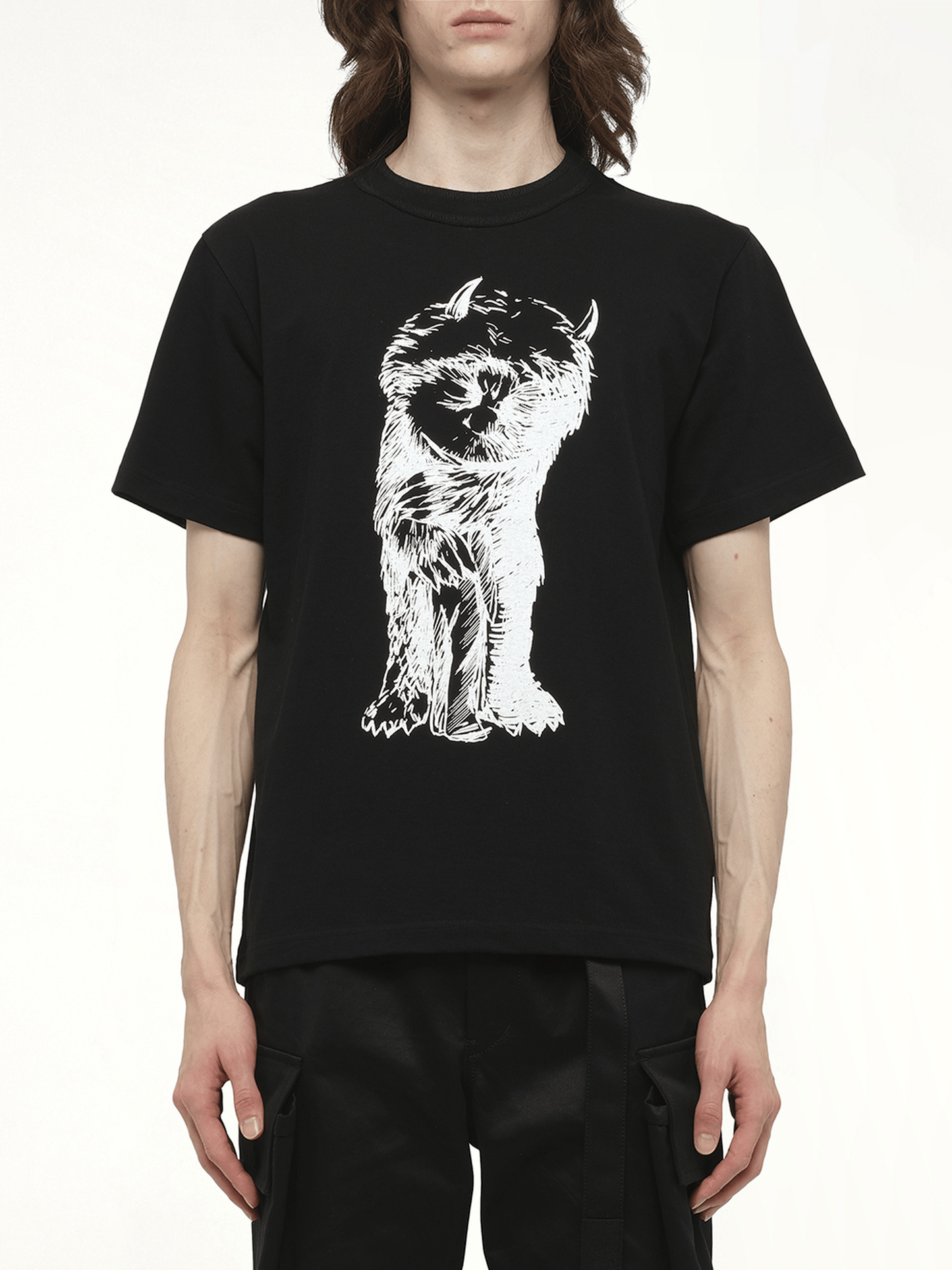 Image of a model wearing Tops. Productname: SACAI WHERE THE WILD THINGS ARE Monster T-Shirt in Black colour by brand - SACAI