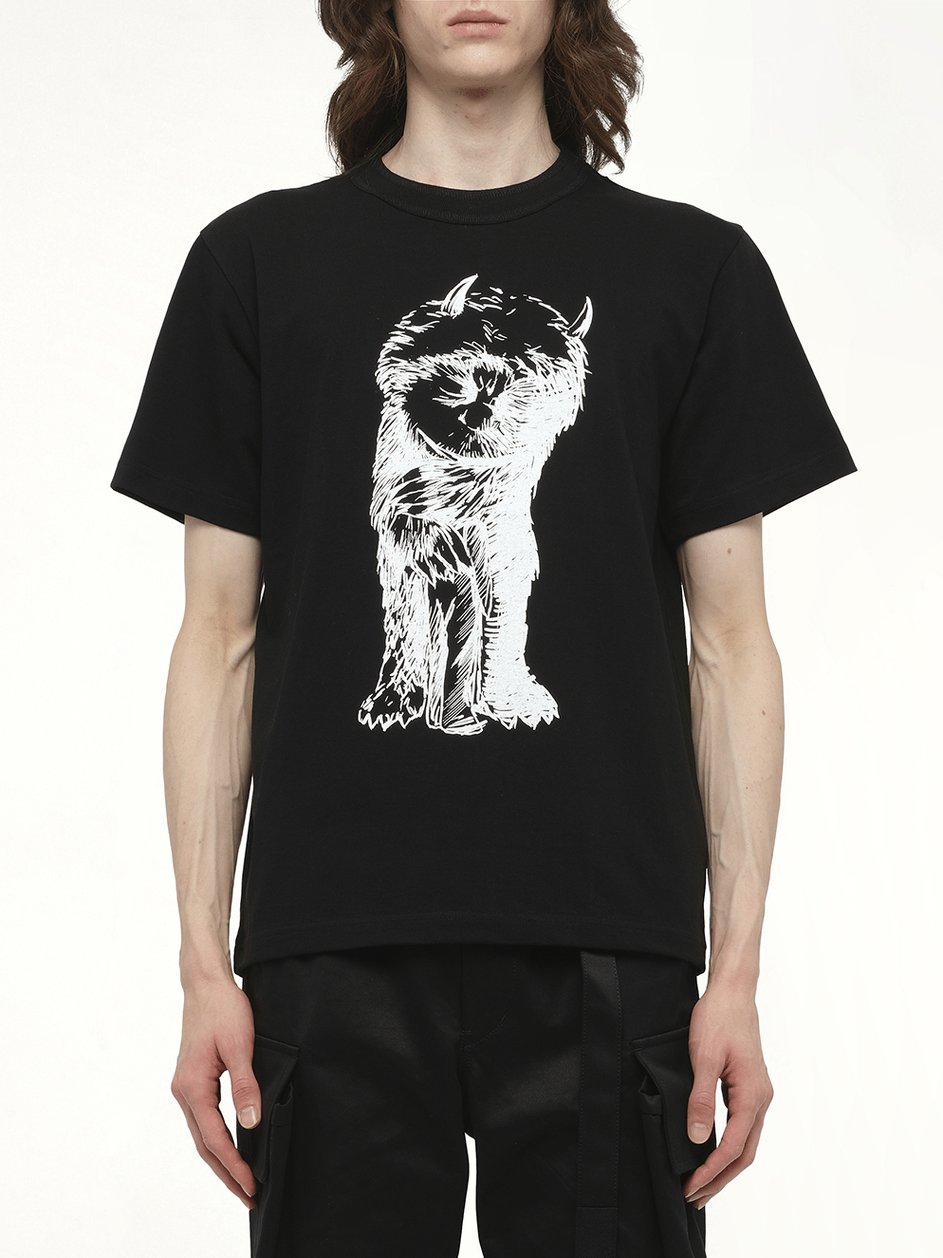 Image of a model wearing Tops. Productname: SACAI WHERE THE WILD THINGS ARE Monster T-Shirt in Black colour by brand - SACAI