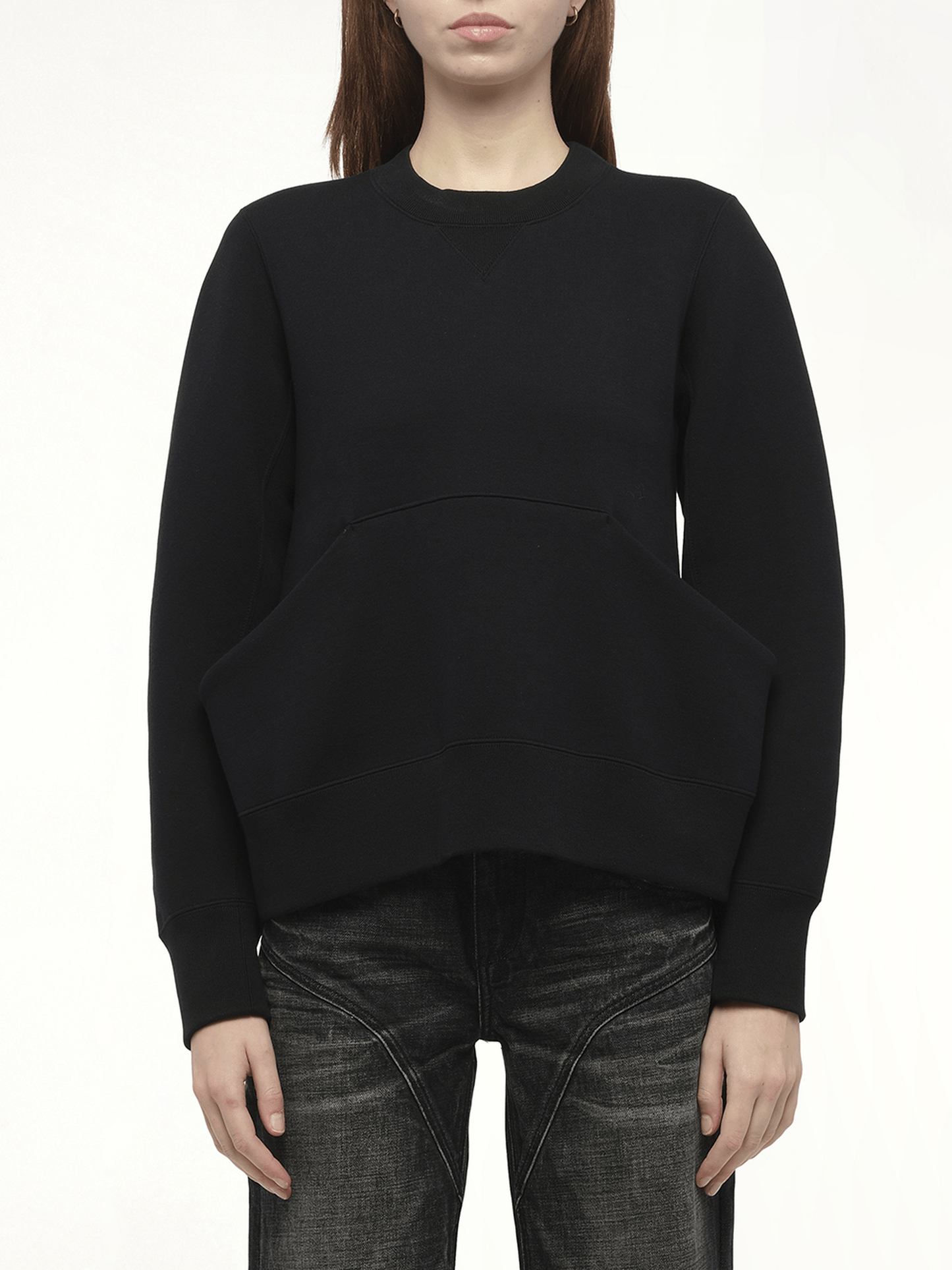 Image of a model wearing Outerwear. Productname: SACAI Sponge Sweat Pullover in Black colour by brand - SACAI