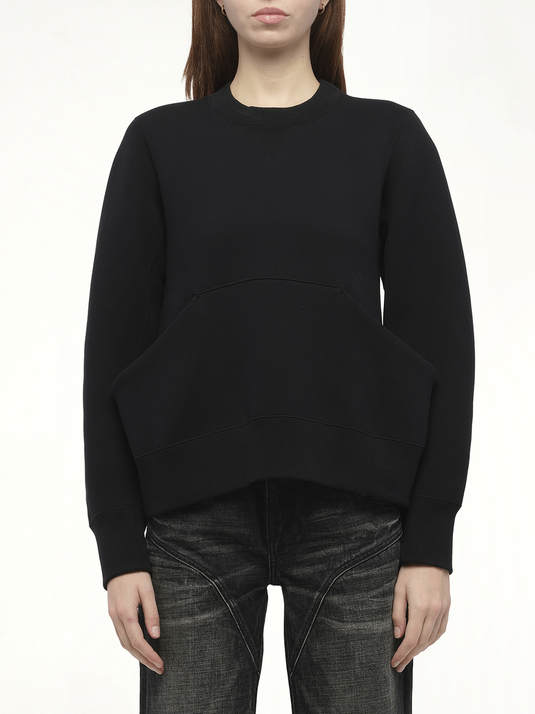 Image of a model wearing Outerwear. Productname: SACAI Sponge Sweat Pullover in Black colour by brand - SACAI