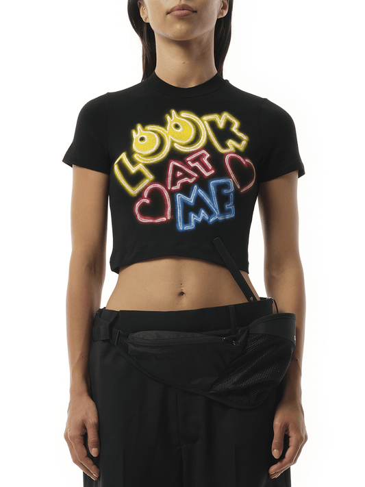 Image of a model wearing Tops. Productname: DOUBLET English Fan-Service Neon Paint T-Shirt in Black colour by brand - DOUBLET