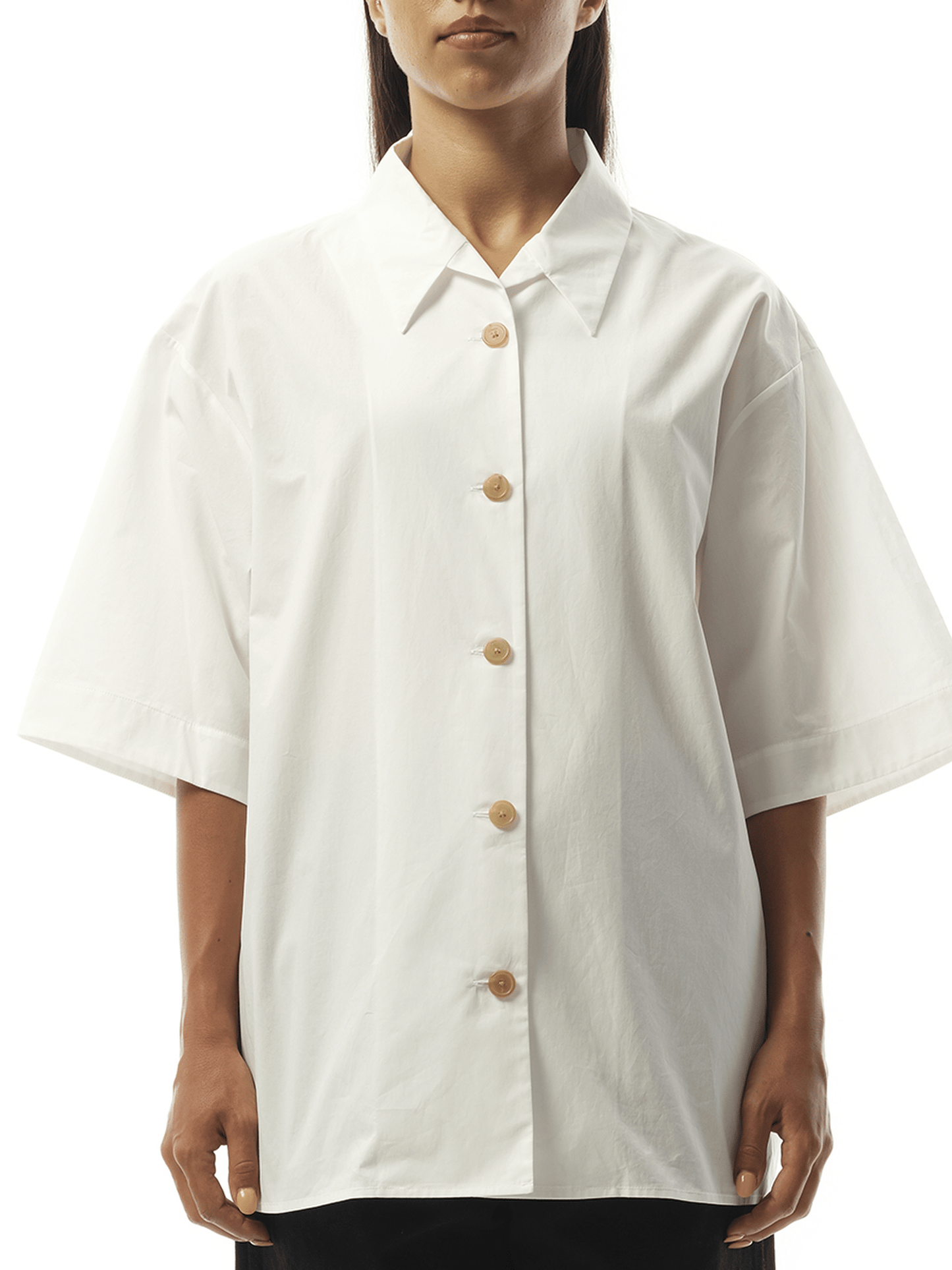 Image of a model wearing Tops. Productname: KHAITE Owen Top in White colour by brand - KHAITE