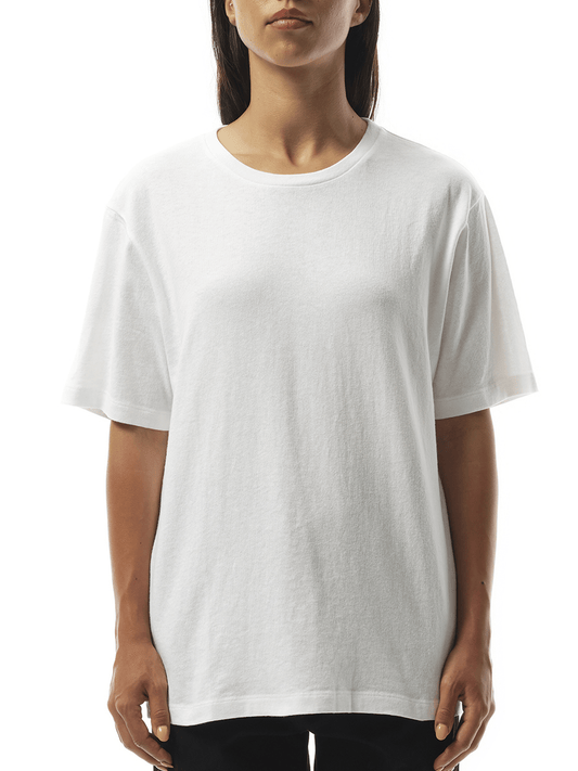 Image of a model wearing Tops. Productname: KHAITE Mae T-Shirt in WHITE colour by brand - KHAITE