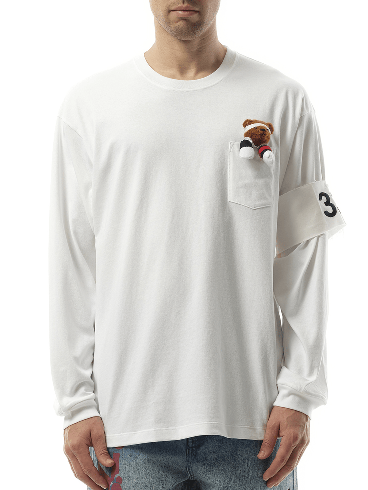 Image of a model wearing Tops. Product name - Support Group Long Sleeve T-Shirt in White colour by brand - DOUBLET