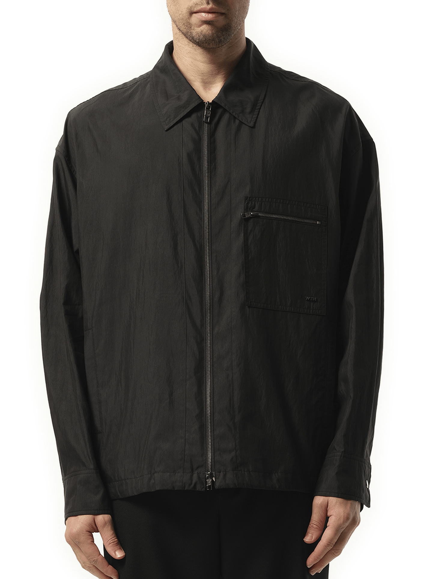 Image of a model wearing Tops. Productname: WOOYOUNGMI Nylon Zip Shirt in BLACK colour by brand - WOOYOUNGMI