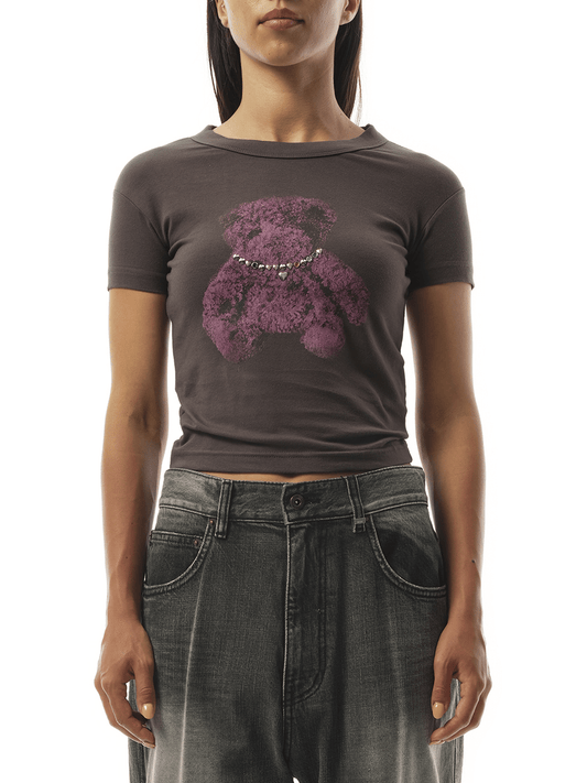 Image of a model wearing Tops. Productname: WE11DONE Womens Studded Bear Cropped T-Shirt in BLACK colour by brand - WE11DONE