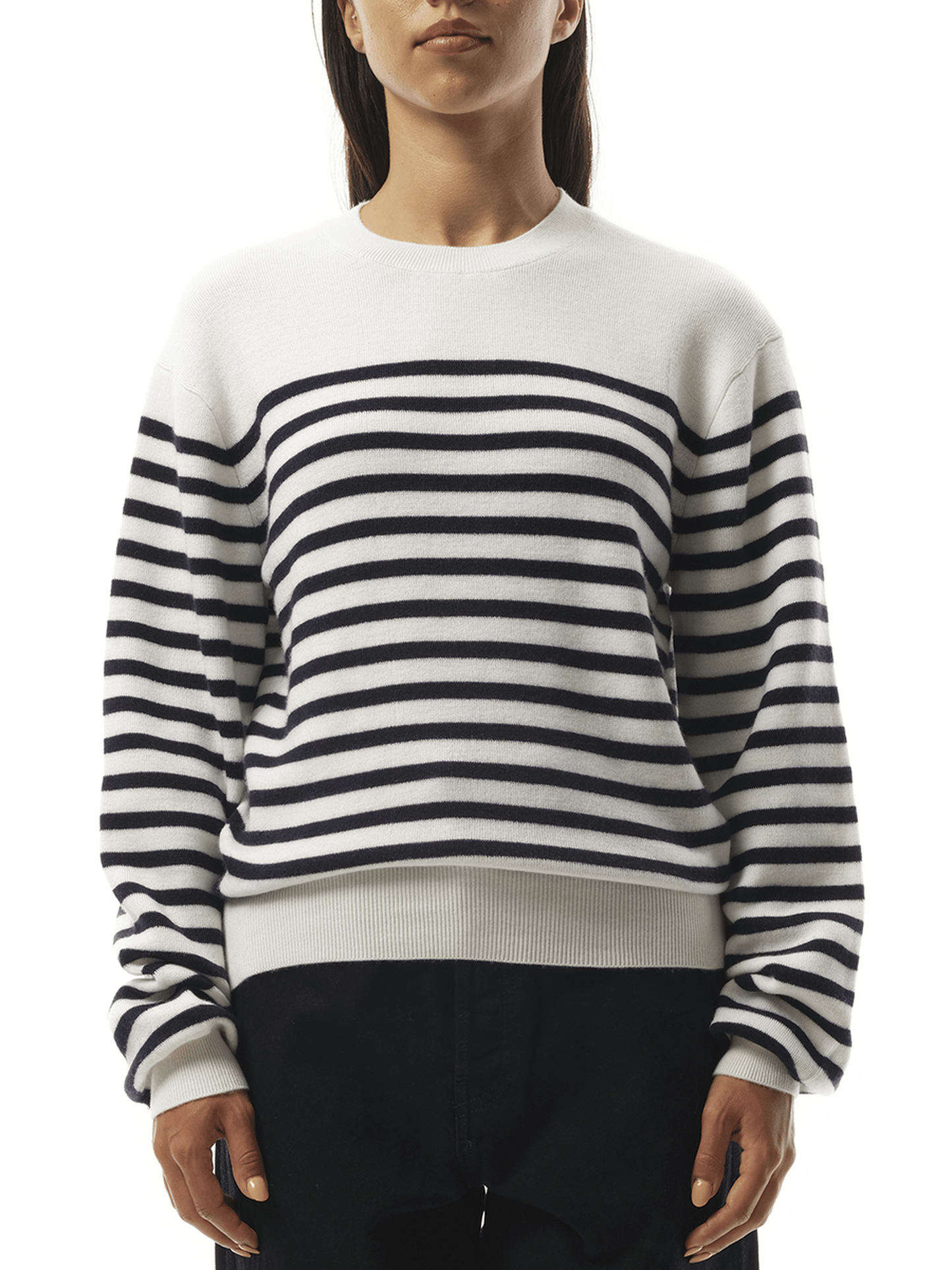 Image of a model wearing Outerwear. Productname: KHAITE Viola Sweater in Glaze Midnight Navy colour by brand - KHAITE