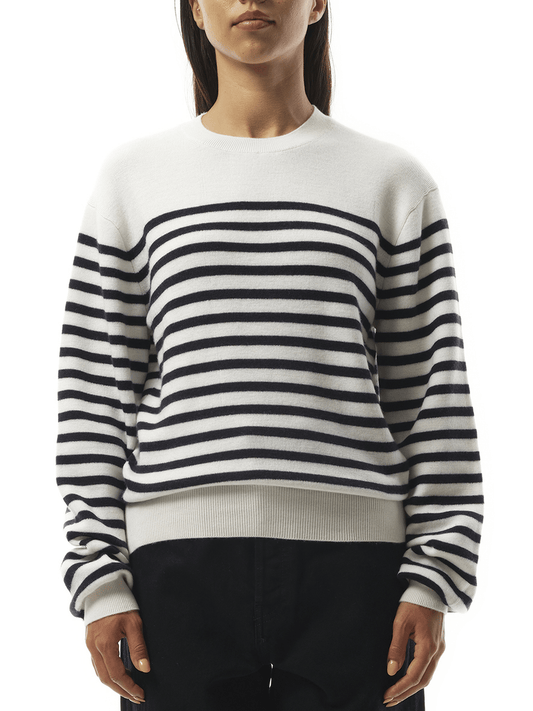 Image of a model wearing Outerwear. Productname: KHAITE Viola Sweater in Glaze Midnight Navy colour by brand - KHAITE