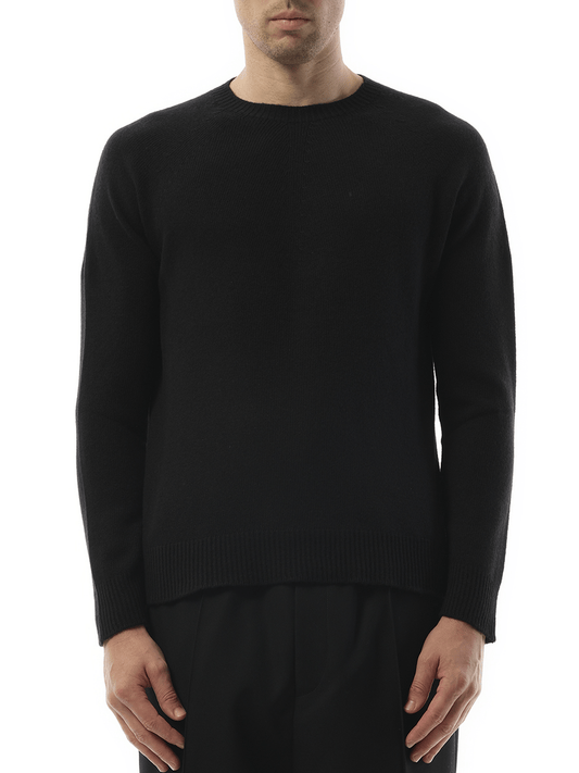 Image of a model wearing Outerwear. Productname: JIL SANDER Cashmere Seamless Sweater in BLACK colour by brand - JIL SANDER