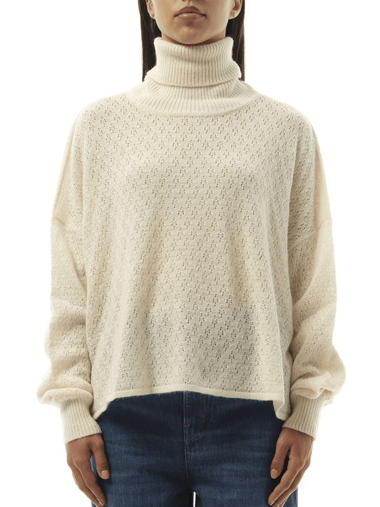 Image of a model wearing Outerwear. Productname: CHLOE Fluffy Pointelle Sweater in Iconic Milk colour by brand - CHLOE