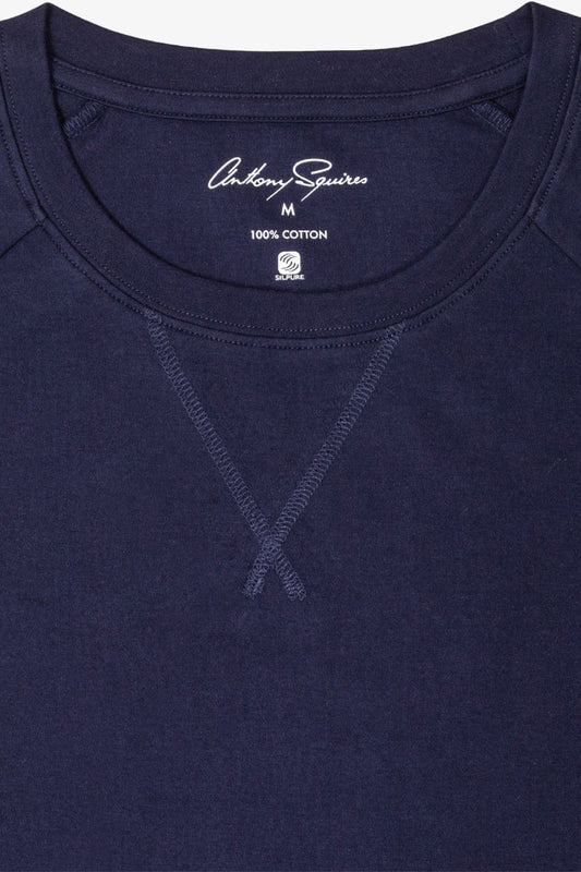Image of a model wearing Tops. Product name - Hugh Navy Long Sleeve Sleep Top in Navy colour by brand - Anthony Squires