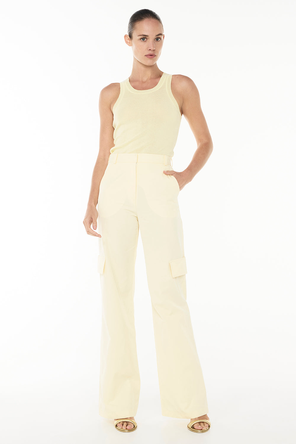 Image of a model wearing Tops. Productname: Day Glow Knit Tank in PALE YELLOW colour by brand - Manning Cartell