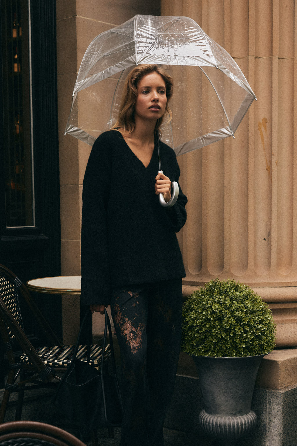 Image of a model wearing Outerwear. Productname: SNDYS ODELIA KNIT JUMPER in Black colour by brand - SNDYS