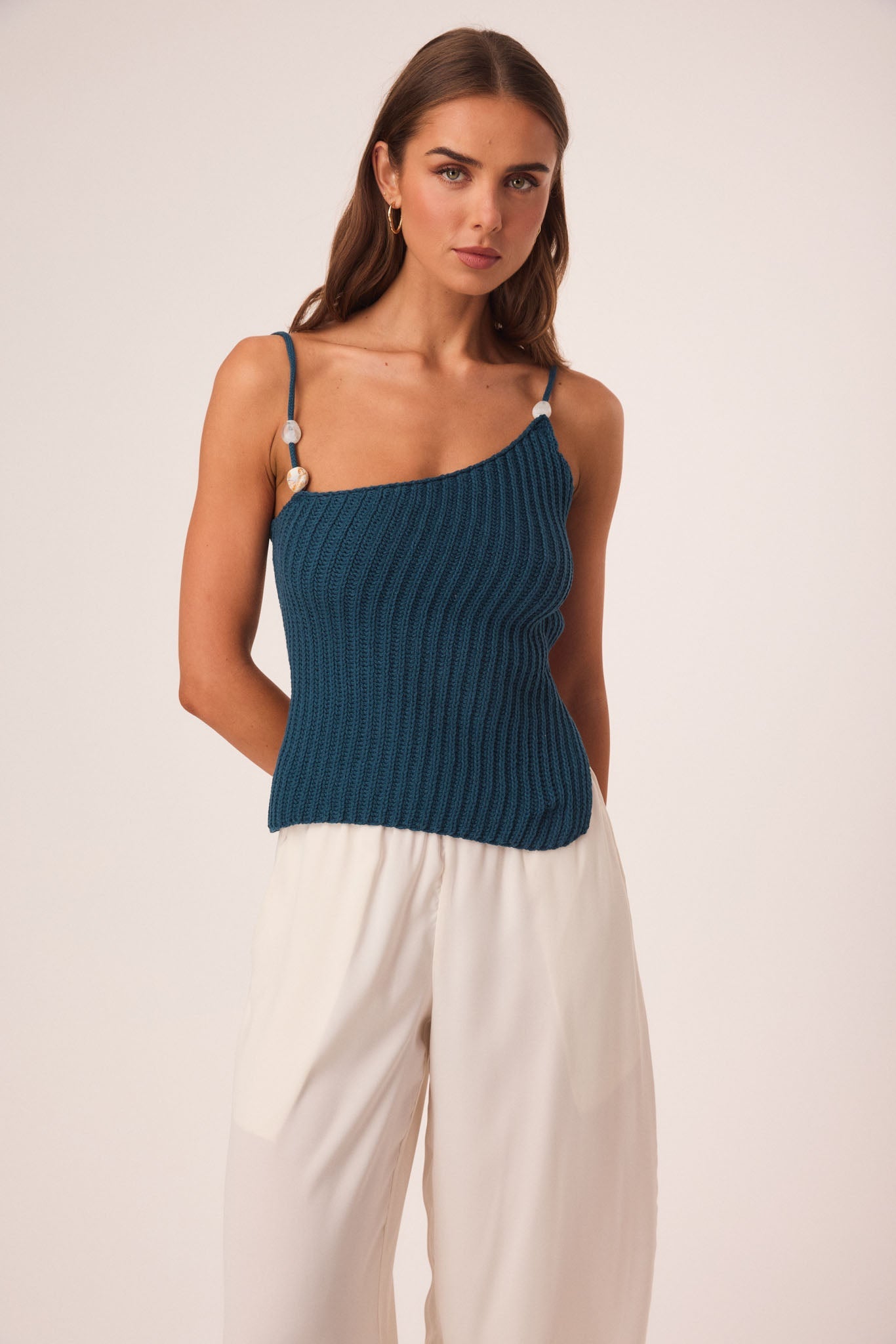 Image of a model wearing Tops. Productname: SNDYS DESI OPEN BACK TOP in Teal colour by brand - SNDYS