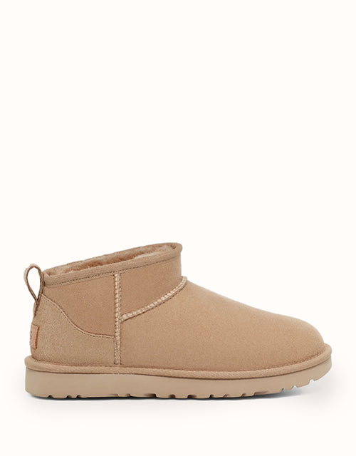 Image of Boots. Product name - UGG Women Classic Ultra Mini Boots in Sand colour by brand - Ugg