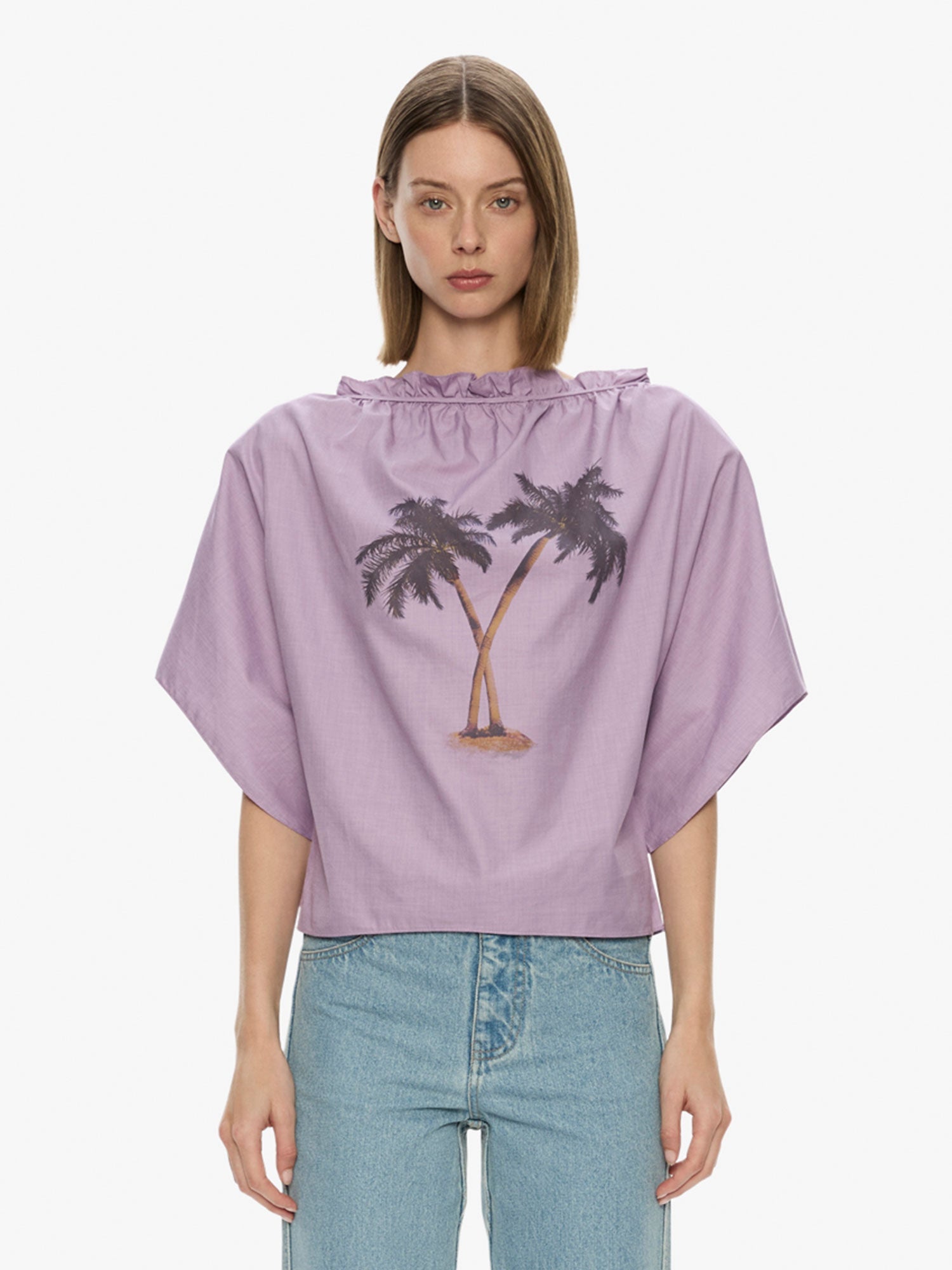 Image of a model wearing Tops. Productname: Mirage Palm Poplin Top in Lilac colour by brand - CHRISTOPHER ESBER