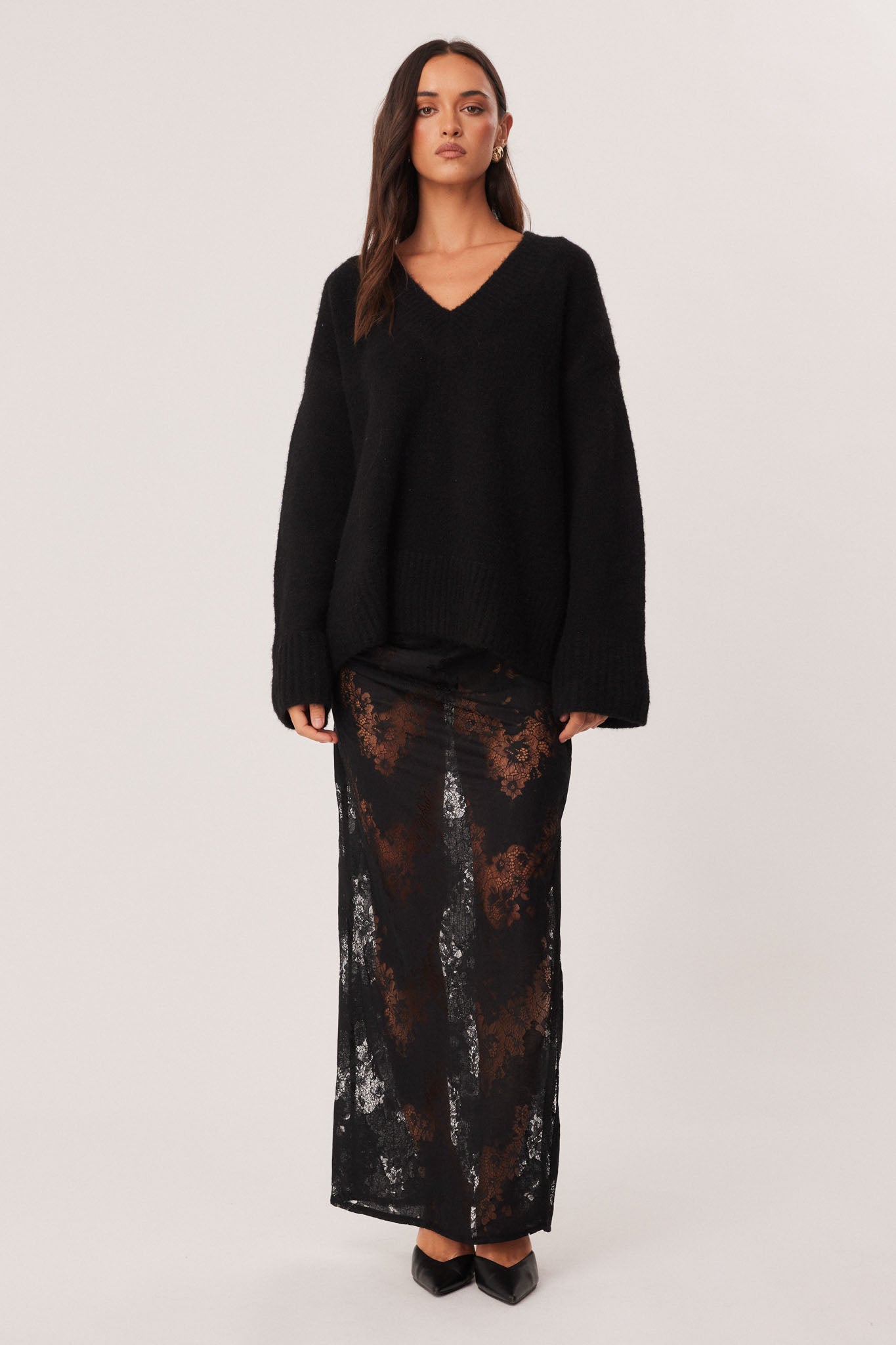 Image of a model wearing Skirts. Productname: SNDYS MISHKA LACE MAXI SKIRT in Black colour by brand - SNDYS