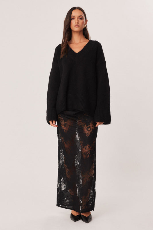 Image of a model wearing Skirts. Productname: SNDYS MISHKA LACE MAXI SKIRT in Black colour by brand - SNDYS