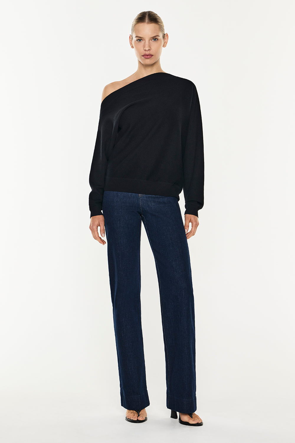 Image of a model wearing Tops. Productname: Future Feeling Knit Top in Black colour by brand - Manning Cartell