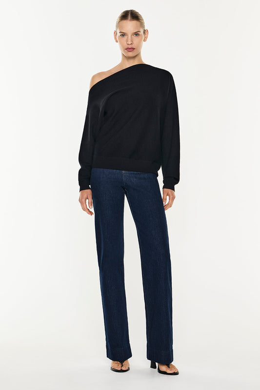 Image of a model wearing Tops. Productname: Future Feeling Knit Top in Black colour by brand - Manning Cartell
