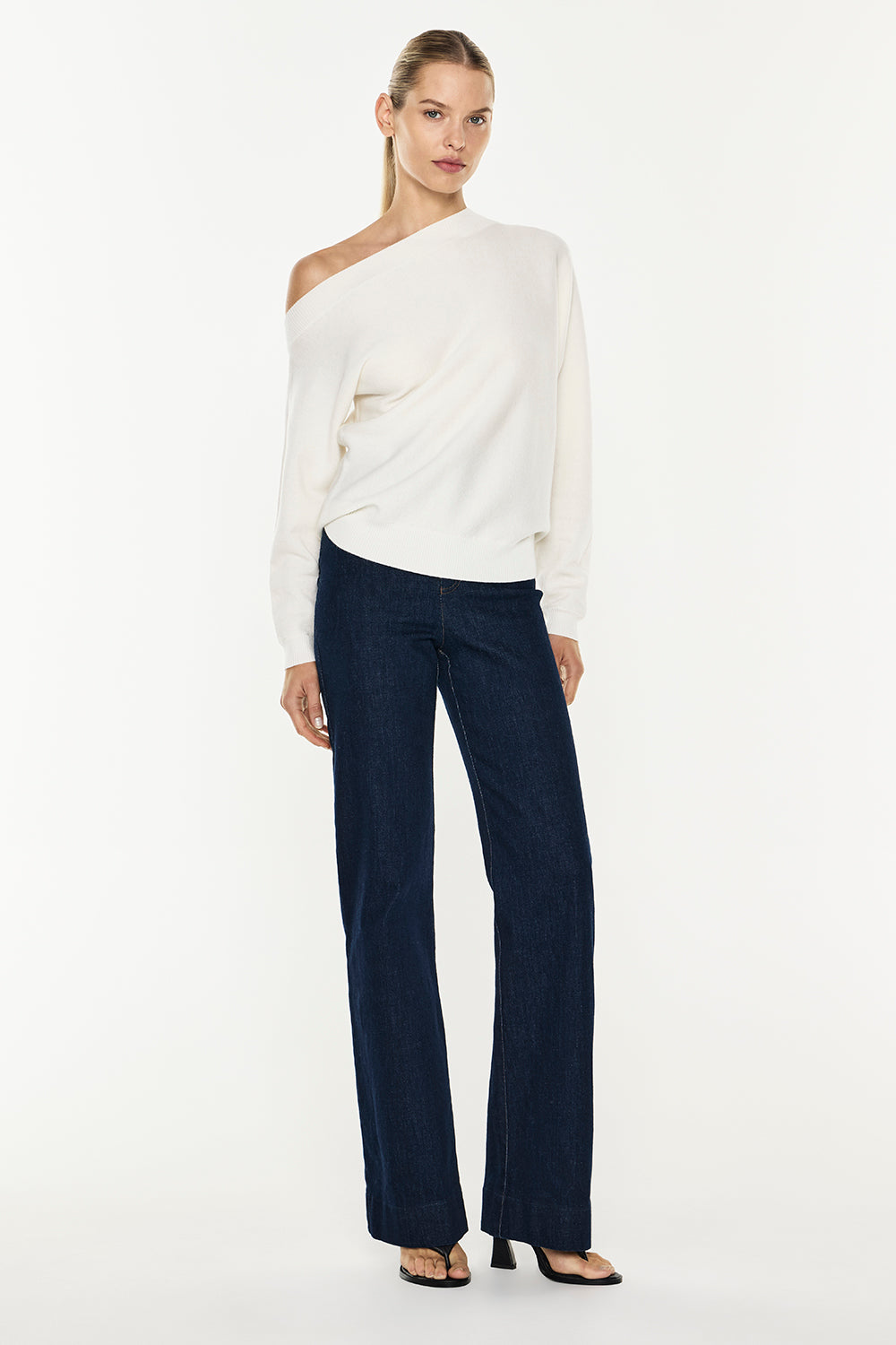 Image of a model wearing Tops. Productname: Future Feeling Knit Top in White colour by brand - Manning Cartell